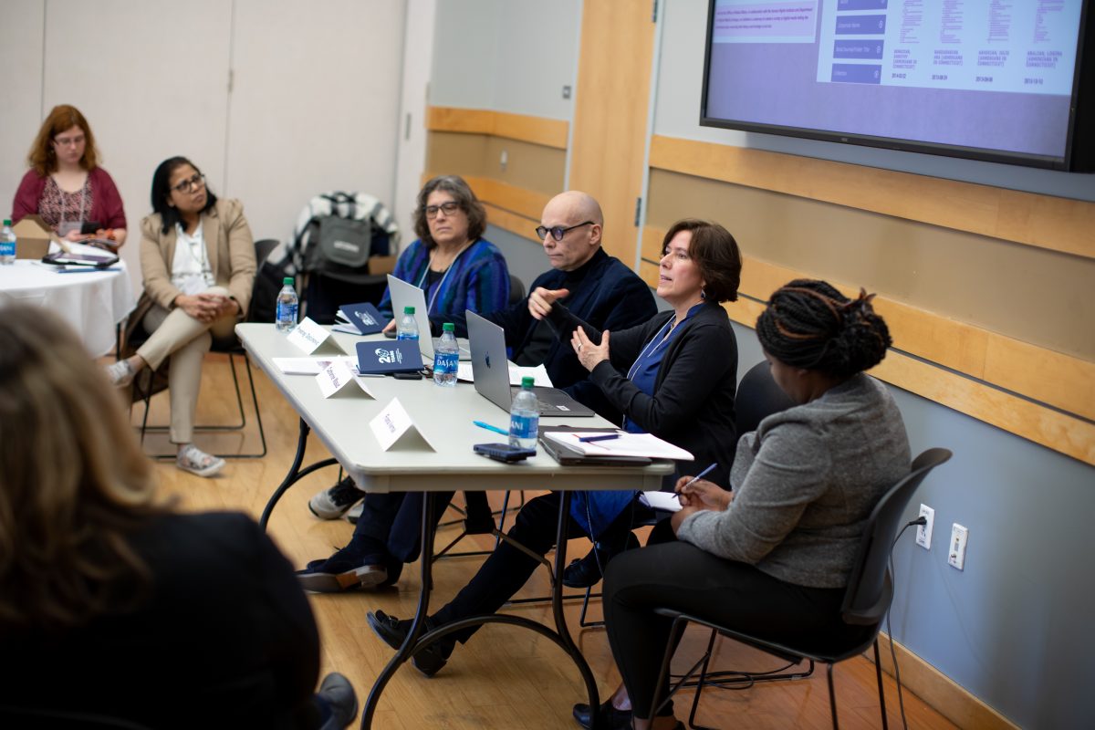 A panel gives a presentation.