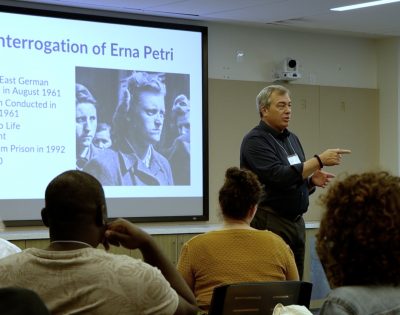 Director of the Dodd Human Rights Impact Programs, James Waller leads a presentation